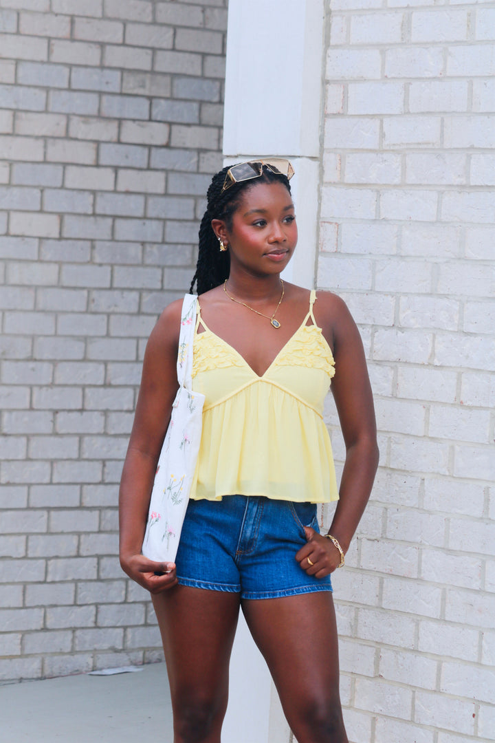 Serena Cutout Detail Sleeveless Peplum Top