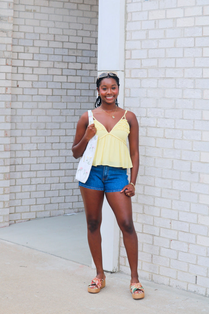 Serena Cutout Detail Sleeveless Peplum Top